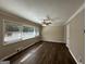 Spacious living room featuring hardwood floors and large windows at 739 Yale Sw Pl, Atlanta, GA 30315