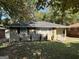 Brick Ranch home with a well-maintained lawn at 739 Yale Sw Pl, Atlanta, GA 30315