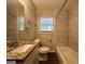 Updated bathroom with granite vanity and tile shower/tub at 739 Yale Sw Pl, Atlanta, GA 30315