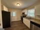 Modern kitchen with granite countertops and stainless steel appliances at 739 Yale Sw Pl, Atlanta, GA 30315