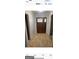 Entryway with tile flooring and wooden door at 4634 Bexley Dr, Stone Mountain, GA 30083