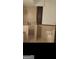 Updated bathroom with walk-in shower and bathtub at 10219 N Dinah Cir, Covington, GA 30014