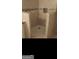 Large walk-in shower with hexagon tile floor at 10219 N Dinah Cir, Covington, GA 30014