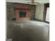 Gathering room with brick fireplace and stone surround at 10219 N Dinah Cir, Covington, GA 30014