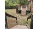 Wooden deck with stairs leading to backyard at 10219 N Dinah Cir, Covington, GA 30014