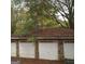 Three-car garage with stone facade at 10219 N Dinah Cir, Covington, GA 30014