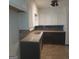 Newly remodeled kitchen with granite countertops and dark wood cabinets at 10219 N Dinah Cir, Covington, GA 30014
