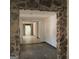 Stone accented hallway leading to another room at 10219 N Dinah Cir, Covington, GA 30014
