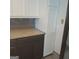 Renovated kitchen boasts granite countertops and updated cabinetry at 10219 N Dinah Cir, Covington, GA 30014