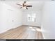 Well-lit bedroom featuring ceiling fan and light flooring at 3363 Delmar Nw Ln, Atlanta, GA 30331
