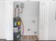 Laundry area with new water heater and vinyl flooring at 3363 Delmar Nw Ln, Atlanta, GA 30331