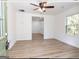 Bright living room with hardwood floors and ceiling fan at 3363 Delmar Nw Ln, Atlanta, GA 30331