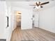 Spacious bedroom with ceiling fan and access to bathroom at 3363 Delmar Nw Ln, Atlanta, GA 30331