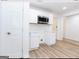 Modern white kitchen with new appliances and countertops at 3363 Delmar Nw Ln, Atlanta, GA 30331