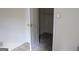 Small walk-in closet with carpeted flooring at 6995 Pine Shadow Way, Winston, GA 30187