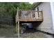 Elevated wooden deck with railing and view of surrounding area at 6995 Pine Shadow Way, Winston, GA 30187