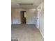 Spacious bedroom with carpet flooring and access to a full bathroom and closet at 6995 Pine Shadow Way, Winston, GA 30187