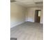 Spacious basement with carpeted floor and doors at 6995 Pine Shadow Way, Winston, GA 30187