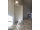 Bright dining area with tile flooring and view of upper level at 6995 Pine Shadow Way, Winston, GA 30187