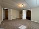 Finished basement with carpet, multiple rooms, and doors at 2755 Knollberry Ln, Decatur, GA 30034