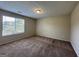 Bright bedroom with window and neutral carpeting at 2755 Knollberry Ln, Decatur, GA 30034