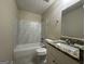 Updated bathroom with granite vanity and marble-tiled shower/tub combo at 2755 Knollberry Ln, Decatur, GA 30034