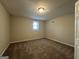Well-lit bedroom with neutral carpeting and a window at 2755 Knollberry Ln, Decatur, GA 30034