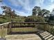 Wooden deck overlooking backyard and neighborhood at 2755 Knollberry Ln, Decatur, GA 30034