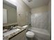 Clean bathroom with granite vanity and tiled shower/tub at 2755 Knollberry Ln, Decatur, GA 30034