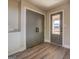 Interior view showing gray doors, wood flooring, and a granite countertop at 5122 Hillcrest Nw Dr, Covington, GA 30014