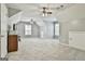 Spacious bonus room with two ceiling fans and abundant natural light at 684 Brooks Woolsey Rd, Brooks, GA 30205