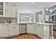 Eat-in kitchen with island, stainless steel appliances, and hardwood floors at 684 Brooks Woolsey Rd, Brooks, GA 30205