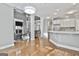 Open concept kitchen with island and views into the living room at 684 Brooks Woolsey Rd, Brooks, GA 30205