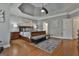 Spacious primary bedroom with hardwood floors and ensuite bathroom access at 684 Brooks Woolsey Rd, Brooks, GA 30205