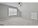 Bright bedroom with carpeted floor, large window, and ceiling fan at 684 Brooks Woolsey Rd, Brooks, GA 30205