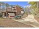 Long driveway leading to the home with a detached shed at 684 Brooks Woolsey Rd, Brooks, GA 30205