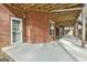 Brick patio with access to backyard and wooded area at 684 Brooks Woolsey Rd, Brooks, GA 30205