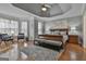 Spacious main bedroom with hardwood floors and large windows at 684 Brooks Woolsey Rd, Brooks, GA 30205