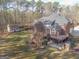 Aerial view of house, detached shed, and large backyard at 684 Brooks Woolsey Rd, Brooks, GA 30205