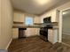 Modern kitchen featuring stainless steel appliances and granite countertops at 2425 Hanford Sw Dr, Atlanta, GA 30315