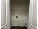 Laundry closet with wire shelving and space for a washer and dryer at 2150 Macon Se Dr, Atlanta, GA 30315