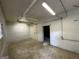 Unfinished basement with concrete floors and exposed utilities at 2150 Macon Se Dr, Atlanta, GA 30315