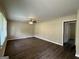Spacious living room with hardwood floors and a ceiling fan at 2150 Macon Se Dr, Atlanta, GA 30315