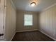 Well-lit bedroom with neutral walls and carpet at 2150 Macon Se Dr, Atlanta, GA 30315