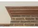 Detailed crown molding above brick fireplace at 7866 Hwy 54, Sharpsburg, GA 30277