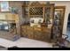Built-in wet bar with wine rack and wood cabinetry at 7866 Hwy 54, Sharpsburg, GA 30277