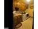 Bright laundry room with washer, dryer, and ample cabinetry at 7866 Hwy 54, Sharpsburg, GA 30277