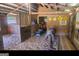 Barn stall with wood flooring and feed area at 7866 Hwy 54, Sharpsburg, GA 30277
