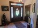 Elegant entryway with stained glass door and tile flooring at 7866 Hwy 54, Sharpsburg, GA 30277