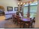 Formal dining room with wood table and chandelier at 7866 Hwy 54, Sharpsburg, GA 30277